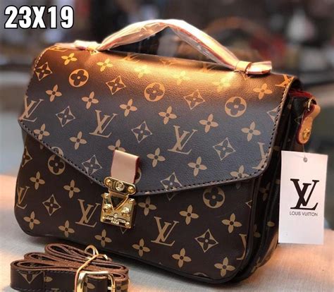 bolsa de mao louis vuitton